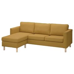 a couch with a footstool sitting next to it on top of a white floor