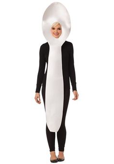 a woman wearing a white and black costume with a large cone on her head, standing in front of a white background