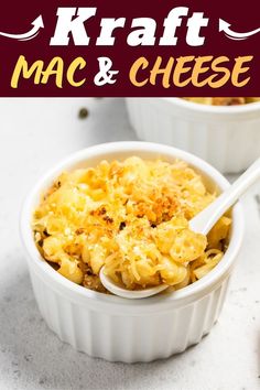 two bowls filled with macaroni and cheese on top of a white countertop