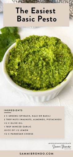 a bowl filled with pesto next to some parsley