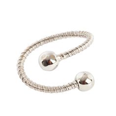 a silver bracelet with two balls on it