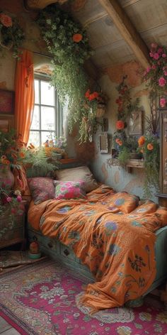 a bedroom with an orange bedspread and flowers on the walls, windows, and rugs