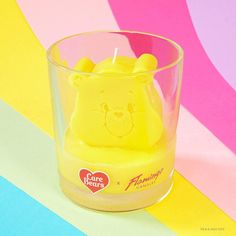 Introducing Care Bears x Flamingo Candles. We've teamed up with the super cuddly Care Bears gang to create the dreamiest candle collection centred around love, kindness and friendship. Full of good vibes, featuring bold Jar Candles, bright Scent Shapes and iconic 3D Candles and filled with fragrances to transport you into the Care-a-Lot world including Fuzzy Wuzzy, Birthday Cake and Watermelon. Our cutest collection yet - nobody cares like a Care Bear! Birthday Bear wants everyone to have a happy birthday. He's a fun-loving bear who enjoys giving presents and playing party games. His belly badge is a birthday cupcake that symbolizes celebration - and that's what birthdays are all about!Yellow 3D Birthday Bear icon in a jar. Hand-poured with yellow soy wax. Scented with Cute Cupcake, a yumm Candles Cute, Care Bear Birthday, Birthday Bear, Cute Cupcake, Fuzzy Wuzzy, Cupcake Birthday, Bear Birthday, Pink Candles, 3d Icons