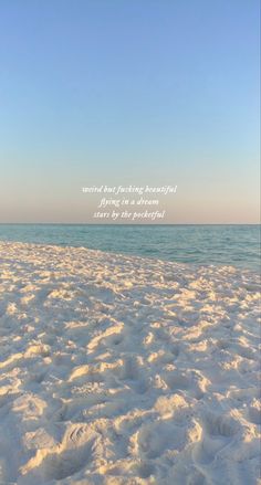 the beach is covered in white sand and has a quote on it that says, what not