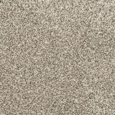 an image of a carpet texture that is very soft and light beige color with some brown spots