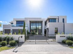 the front entrance to a modern home