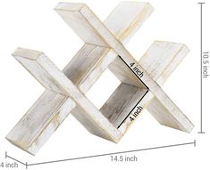 a wooden cross is shown with measurements for the size and width on this wall hanging