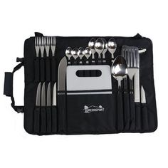 an assortment of silverware and utensils in a black case on a white background