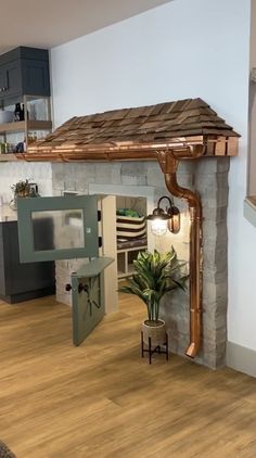 a kitchen with an oven, stove and counter top in the middle of it's room