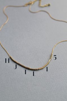 Customize your very own MORSE CODE NECKLACE with the six numbers/letters of your choice. Leave your six characters before checkout under "Order special instructions". The beads are free-moving and will travel along the chain as you move. Sold individually Either 18" long or 20" long with a 2" 24K Gold Filled extender chain 0.7mm wide beading Snake Chain 2mm wide ball beads 1.5x5mm wide tube beads 3 grams in weight Please expect slight imperfections, as this necklace is fully assembled by hand Morse Code Necklace, 6 Characters, Morse Code, Tube Beads, Snake Chain, Gold Filled, Fine Jewelry, Im Not Perfect, Coding