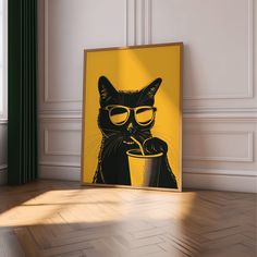 a black cat wearing sunglasses and drinking from a cup in front of a yellow poster