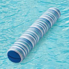 a blue and white striped tube floating in the middle of a swimming pool with clear water