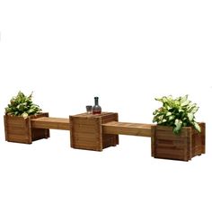 three wooden planters with plants in them