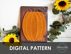 an orange pumpkin on a wooden board with sunflowers in the background and text overlay that reads, digital pattern