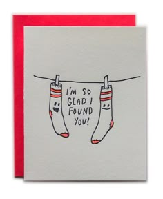 a card with two socks hanging on clothesline saying i'm so glad i found you