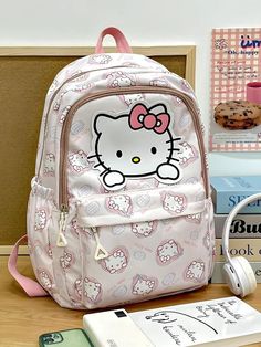 Carry your essentials in this adorable backpack that showcases a playful Hello Kitty design. The spacious compartments and durable construction make it both cute and practical for daily use, adding a touch of fun to your outfit. Kawaii aesthetic Sanrio characters: hello kitty, kuromi, cinnamoroll, pochacco, my melody, pompompurin Zip closure Side water pocket Laptop, tablet pocket inside Size: length 30cm (11.81inch), height 43cm (16.92inch) Sanrio Backpack, Fall Sweaters For Women, Bags Pattern, Hello Kitty Kuromi, Kitty Items, Crop Pullover, Couture Style, Denim Hoodie, Jogger Pants Casual