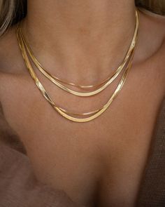 "Dainty layering 1mm box chain necklace. Dimensions 1\" thickness and 16\", 18'', or 20'' length. Materials 14k gold filled *Hypoallergenic *Nickel free *Water resistant Notes ~ Soft jewelry pouch included. ~ Limit contact with water for longer durability and prevent tarnishing ~ Avoid contact with household chemicals like perfume, sprays, lotions, sunscreen and hair products. ~ Store your jewelry separately from other jewelry when not in use. Secure clasps and closures to avoid scratches and ta Sport Clothing, Gold Neckles, Gold Herringbone Chain, Layering Necklaces, Herringbone Necklace, Spring Wear, Luxury Wear, Dresses Modest, Dainty Gold Necklace