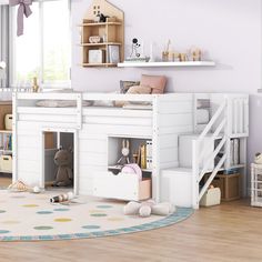 a child's bedroom with a loft bed and stairs to the second floor is decorated in pastel colors