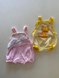 Set of 2 vintage baby girl rompers.  Pink romper is soft terry cloth with embroidered train on the yoke, ric rac trim, and snaps in the saddle.  Yellow romper has an embroidered tiger on the front and ruffled accents, snaps in the saddle.  Both button at the chest.  Both have new elastic added.  Very good vintage condition on both.  If you need specific measurements, don't hesitate to ask. Yellow romper is by Carter's is labeled 6 months, 14-18 lbs. Pink romper is by Tiny Tots Original, no size 90s Baby Clothes, Baby Clothes Aesthetic, Rompers Pink, Vintage Baby Girl Clothes, 2 Month Baby, Embroidered Tiger