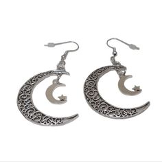 Big Hollow Crescent Moon, Solid Smaller Crescent Moon With Star, Silver Colored, Drop Down Dangle Style, New. A Unique And Elegant Piece Of Jewelry. These Earrings Feature Two Crescent Moons Connected Together And A Star. The Earrings Are Lightweight And Easy To Wear, Making Them Perfect For Everyday Use. The Crescent Moon And Star Symbols Are Often Associated With The Night Sky And The Mystery Of The Universe, Making These Earrings A Perfect Choice For Those Who Love Astrology, Spirituality And Mythology. The Dangle Design Of The Earrings Creates A Beautiful Movement And Adds An Extra Touch Of Elegance To Any Outfit. These Earrings Are Perfect For Adding A Touch Of Elegance To Any Outfit Astrology Spirituality, Free People Earrings, Dance Earrings, Crescent Moon And Star, Pink Tassel Earrings, Gold Jhumka Earrings, Silver Threader Earrings, Large Stud Earrings, Star Silver