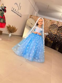 The package includes a dress, cape and accessories. This cool Elsa-inspired costume is back in stock. It is a special production, our product is made of the highest quality materials suitable for children's use... It is fully lined. This dress is handmade. Your little princesses will dazzle in this dress. Perfect for birthdays, photo shoots or parties. - All dresses are made to order. All dress pictures are 100% real product pictures! -You can check out our other Elsa models here. https://www.et Elsa Inspired Dress, Elsa Halloween Costume, Elsa Birthday Party, Costume Princess, Elsa Birthday, Dress Cape, Frozen Costume, Dress Pictures, Elsa Dress