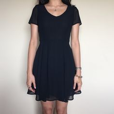 🎉HP 11/22🎉 Cotton On Little Black Chiffon Dress Black. Chiffon dress with v-neckline, short sleeves and a flowy skirt. 100% polyester. New with tags. Cotton On Dresses Casual Fitted A-line Chiffon Dress, Black Short Sleeve V-neck Dress For Day Out, Fitted Casual Chiffon Dress For Party, Casual Fitted Chiffon Dress For Party, Casual Fitted Chiffon Party Dress, Black V-neck Short Sleeve Dress For Day Out, Flowy Chiffon Mini Dress With Short Sleeves, Casual Chiffon V-neck Mini Dress, Chic Fitted Chiffon Dress With Short Sleeves