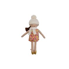 a stuffed animal doll with a white hat and scarf on it's head,