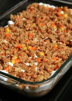 a casserole dish filled with carrots and cereal