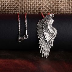 Wing Pendant, Guardian Angel, Protection Necklace, Religious Jewelry, Christian Accessory, Faith Necklace, Prayer Jewelry, Holy Pendant Carry the protection and blessings of the guardian angel with this beautifully crafted wing necklace. Symbolizing faith, hope, and divine love, this pendant stands as a constant reminder of the heavenly forces watching over you. An emblem of prayer and spirituality, it's a perfect gift for the faithful at heart, serving as a tangible piece of heaven. ✦ Jewelry Details ✦ • Material: 925 Sterling Silver • Pendant's Dimensions: 23x45mm • Weight: 9-10 grams • Finish: Oxidized, Polished, Gold, Rose Gold (It can be made in any combination) • Stamp: 925 • Bail: 4mm • Ideal for daily use with an oxidized finish on 925 sterling silver, which makes details more attr Guardian Angel Protection, Angel Accessories, Angel Protection, Prayer Jewelry, Christian Accessories, Faith Necklace, Divine Love, Jewelry Details, Wing Necklace