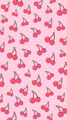 a pink background with cherries and polka dots