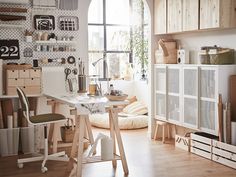 a room filled with lots of furniture and shelves