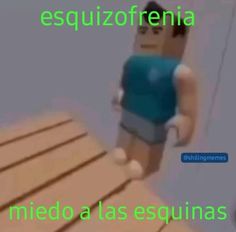 a lego man standing on top of a wooden floor next to a sign that says, esquizofernia