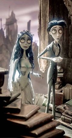 the corpse bride and groom are standing next to each other in front of stacks of books