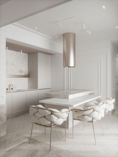 a large white table surrounded by chairs in a room