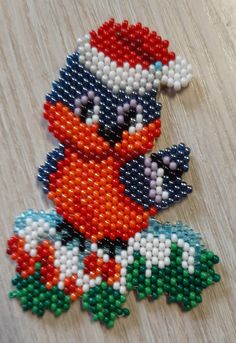 the beaded brooch has been made to look like an animal