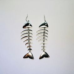 Super cute fishbone dangle drop earrings. Not intended for children ages 13 and under. Also, for many items we can accommodate large orders, so please send us a message. Fish Skeleton, Fish Jewelry, Bone Earrings, Choker Collar Necklace, Costume Necklaces, Choker Collar, Fish Bone, Summer Jewelry, Beach Sand