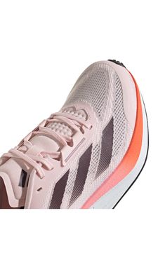 A breathable mesh upper promotes airflow in an athletic sneaker designed for running that's built with plush cushioning and a lightweight, flexible sole. Lace-up style Synthetic and textile upper/textile lining/synthetic sole
 Imported Adidas Running Shoes With Boost Midsole, Adidas Functional Running Shoes With Boost Midsole, Fade-resistant Synthetic Running Shoes For Workout, Adidas Running Shoes With Boost Midsole For Sports, Athleisure Fade-resistant Trail Running Shoes For Jogging, Adidas Trail Running Shoes For Jogging In Athleisure Style, Adidas Cushioned Functional Running Shoes, Adidas Athleisure Trail Running Shoes, Adidas Athleisure Trail Running Shoes For Jogging