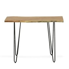 a wooden table with hairpin legs and a wood slab on the top, against a white background