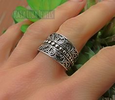 Mens or Womens Celtic Floral Swirl vine twirl Scroll wide band thumb Ring 6-12 SOLID sterling stamped 925 silver 6 7 8 9 10 11 12 **IF YOUR SIZE ISNT SHOWING, CONTACT US TO SEE IF WAS REPLENISHED** Top of ring width is 14.4mm Band width is 10.7 and shank is 8.9 TARNISH FREE Rhodium plated to avoid tarnishing Stamped 925 Nothing but the best from my custom jewelry store. Email me if you have any questions. Silver Leaf Ring, Vero Beach Fl, Bohemian Ring, Bold Rings, Swirl Ring, Wave Ring, Thumb Ring, Bohemian Rings, Thumb Rings