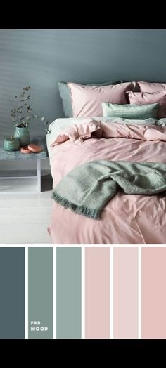 a bedroom with pink and grey colors