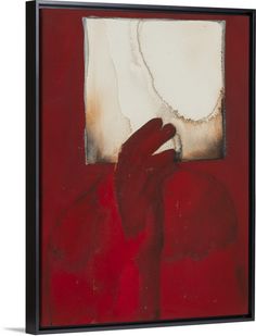 a painting with red and white colors on the wall next to a hand reaching for something