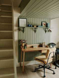 a chair and desk in a room