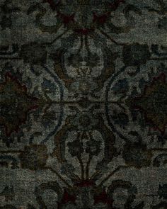 an area rug with many different designs on it