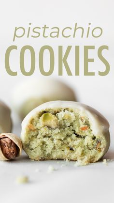 a close up of some food on a table with the words pistachio cookies