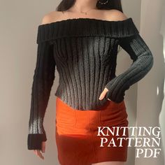 a woman wearing an off the shoulder sweater and orange skirt