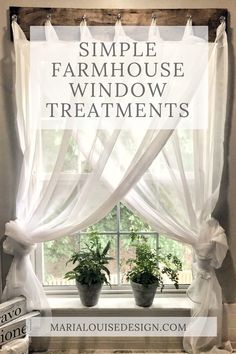 a window with white curtains and some plants in the window sill next to it