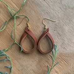 Leather Hoop Earrings – Haute JS Design Leather Earrings Diy How To Make, Leather Strip Earrings, Folded Leather Earrings, Cute Leather Earrings, Leather Earring Patterns Free, Crafts With Leather Scraps, Homemade Leather Earrings, Braided Leather Earrings Diy, Small Leather Earrings