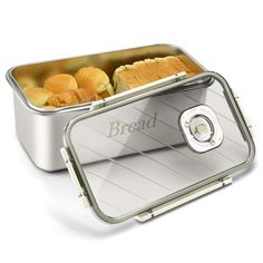 an open tin with bread in it on a white background