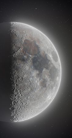 an artist's rendering of the moon in space, with stars and dust around it