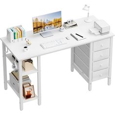 a white desk with drawers and a computer monitor on it's side, next to a printer